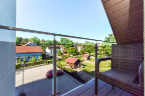 Gėlių terasos - studija su balkonu in Juodkrante